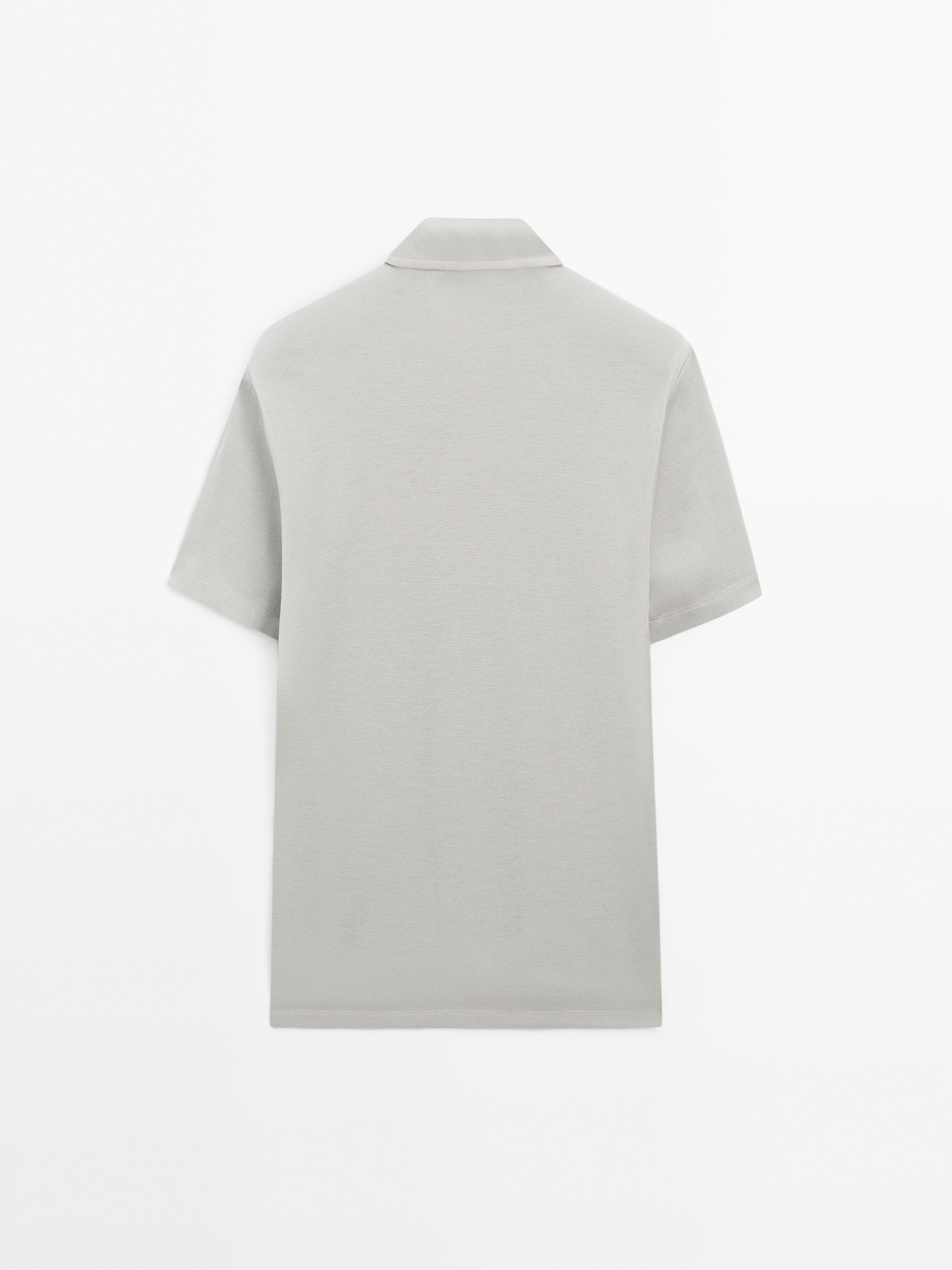 Textured short sleeve polo shirt